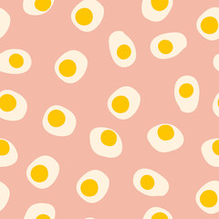 Vector seamless pattern with fried eggs with trendy style. Suitable for textiles.