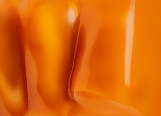 Abstract Caramel textured background. Caramel wallpaper. Pattern