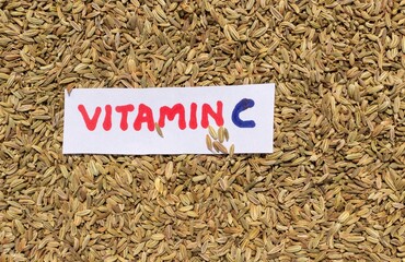Vitamin C Phrase Note Isolated on Organic Fennel Seed Heap in Horizontal Orientation