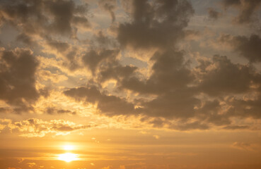 Colorful clouds at sunset as background.