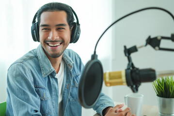 content creator occupation concept. Two influencer record podcast audio in-home office by a...