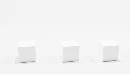 3d-rendering of three white cubes with the same size in front of a white background