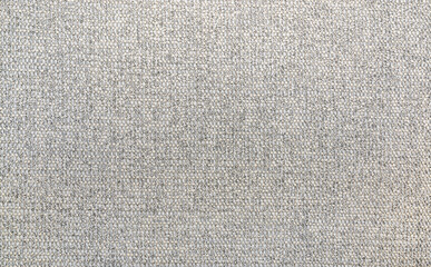 Abstract background of gray cotton fabric for furniture upholstery. The surface of a thick coarse...
