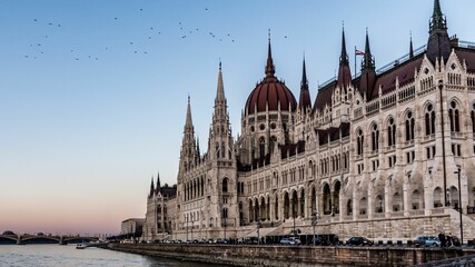 Ancient Hungarian Parliament Building on the sunset