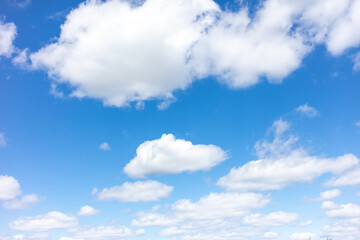 Fototapeta na wymiar White clouds against the blue sky.