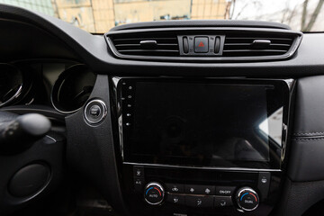 Modern car interior with dashboard and multimedia