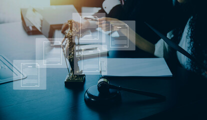 Business and lawyers discussing contract papers with brass scale on desk in office. Law, legal services, advice, justice and law concept picture with film grain effect