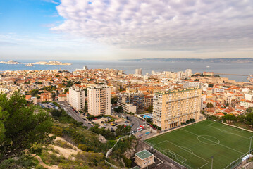 Soccer field on the sea coast, between old residential buildings © Vladyslav