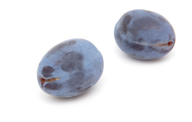 Ripe plum berries isolated on white background.