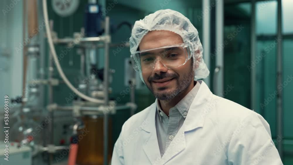 Poster portrait of a man scientist in uniform working in curative laboratory for chemical and biomedical ex