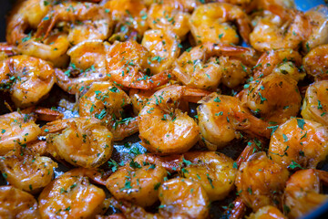 Jumbo Shrimp Scampi Sauteing in Butter and Olive Oil 