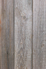 Old faded wooden planks empty background. Vertical