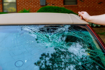 During an accident, the windshield of car was broken