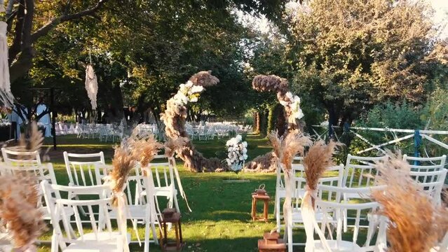 Beautiful wedding setup background ,Aerial drone shot of .
Wedding day event organization table setting decor. luxury event.