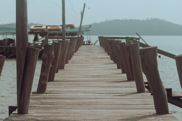 Fototapeta premium A Wooden Pier by the Sea.