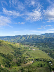 Naklejka premium landscape with mountains and blue sky in San Jose de Isnos