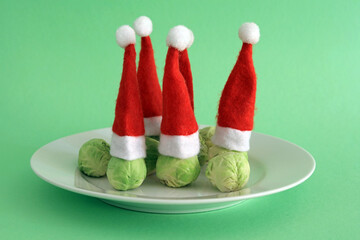 Santa Claus hats on Christmas Brussel Sprouts