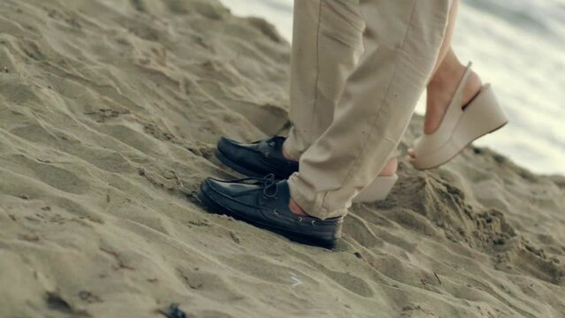 person walking on the beach