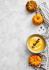 Homemade autumn pumpkin soup with squash seeds
