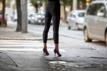 woman prostitute waiting for client on street