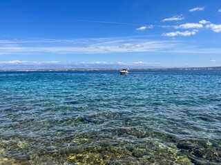 Blue sea horizon, blue sky, natural colors, pure sea water surface