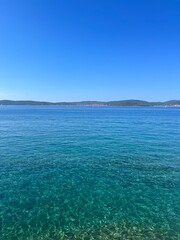 Fototapeta na wymiar Blue sea horizon, blue sky, natural colors, pure sea water surface