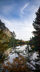 The mountain view is mesmerizing. The water elements such as lakes, waterfalls, or rivers highlight how the mountains have been shaped. 
The color change between autumn and spring is breathtaking!