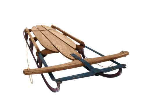 Antique wood snow sled isolated.