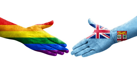 Handshake between Fiji and LGBT flags painted on hands, isolated transparent image.