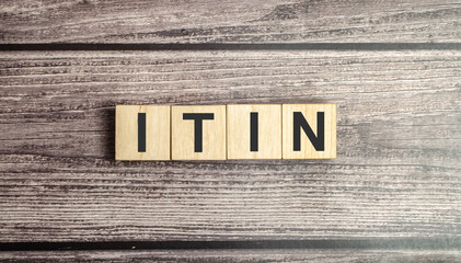 ITIN - Individual Taxpayer Identification Number acronym on wooden blocks