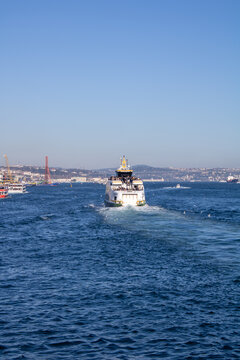 Istanbul, Turkey - February 2022: An excursion boat sailing in the Bosphorus of Istanbul, Turkey.