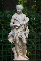 Obraz premium Marble statue of allegory of noon in Summer Garden, Saint Petersburg, Russia