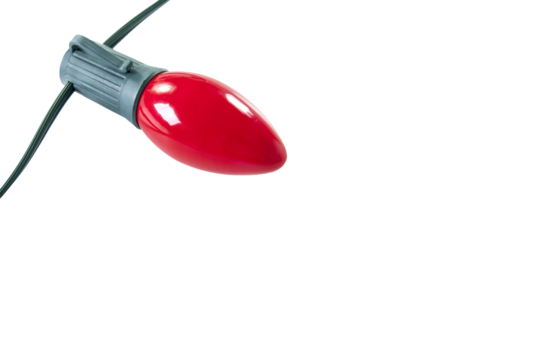 Isolated red c9 light bulb with a green base and wire