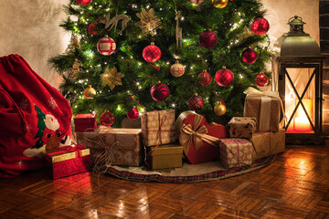 Wrapped presents under the Christmas tree - 538708637