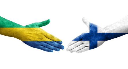 Handshake between Finland and Gabon flags painted on hands, isolated transparent image.