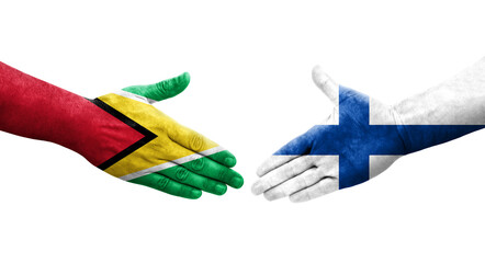 Handshake between Finland and Guyana flags painted on hands, isolated transparent image.