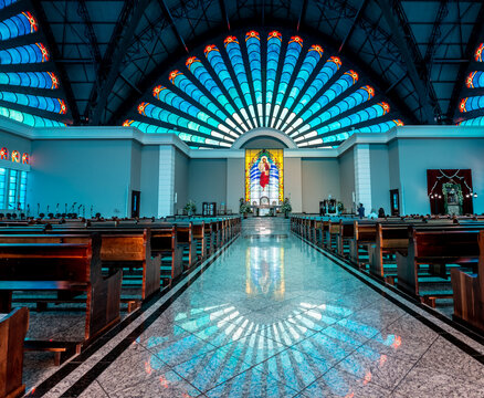 Interior of the Sant'Ana catholic cathedral with the vitrage window and altar in Ponta Grossa