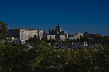 Fototapeta na wymiar The moon over royal castle in Madrid, Spain