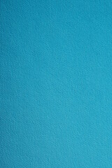 Background of sheet of blue cardboard paper with ribbed texture