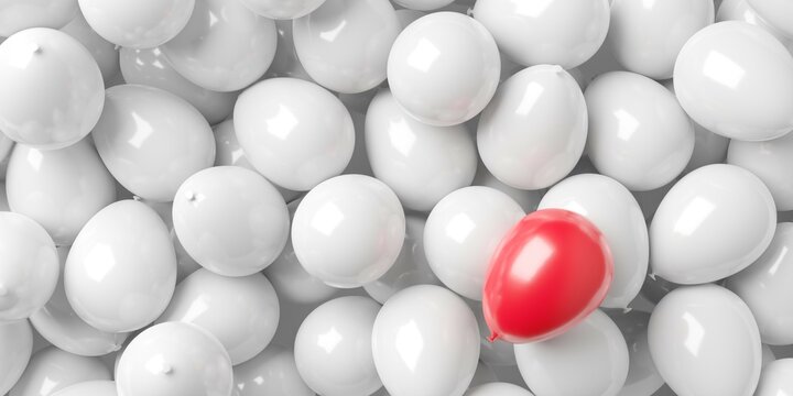 Heap of white balloons with on red balloon above, standing out, being different or leadership concept
