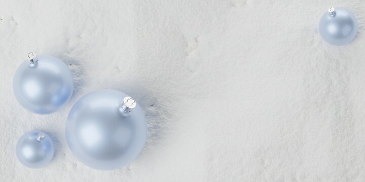 Light blue christmas bauble balls on snow background with copy space flat lay top view from above