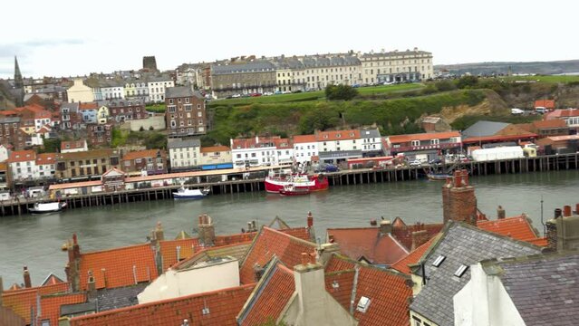 Panorama over Whitby harbour and town from the 199 steps. Captured on a grey and overcast autumn day