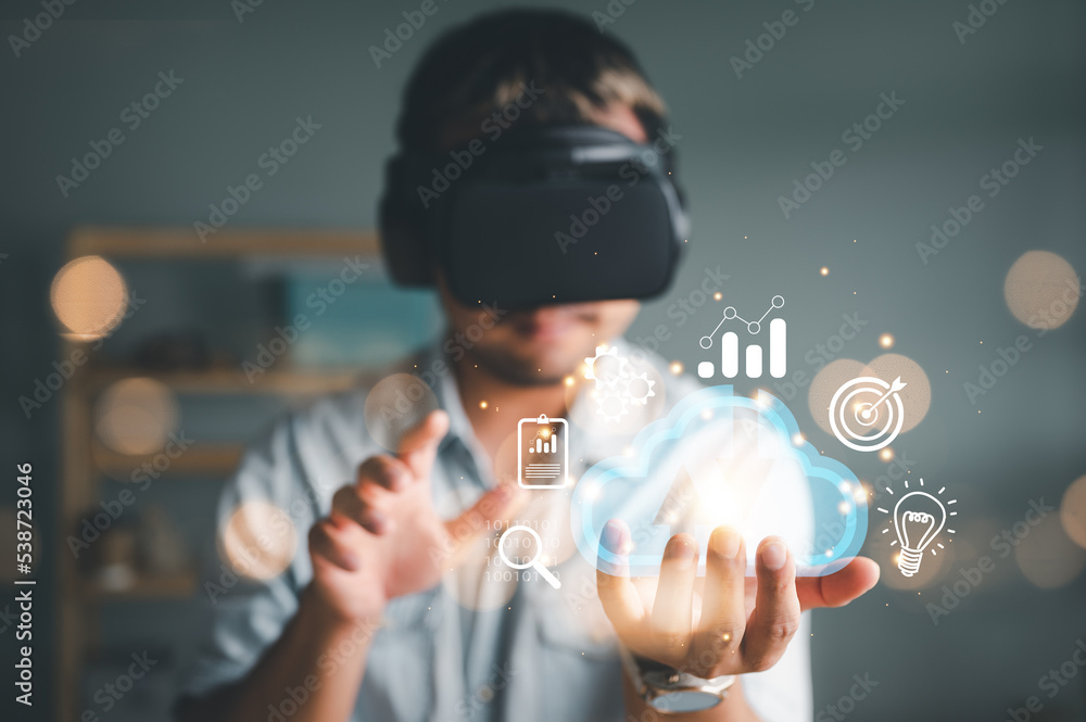 Leinwandbilder man wearing VR glasses and accessing the Cloud Computing Technology Internet Storage Network Concept And a large database big data Through internet technology..