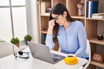 Young woman stressed working at home