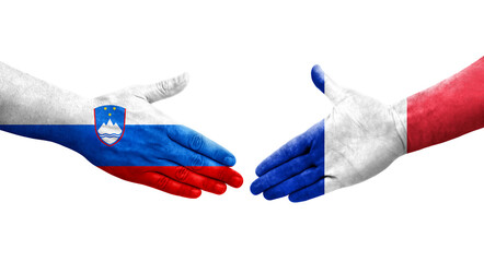 Handshake between France and Slovenia flags painted on hands, isolated transparent image.