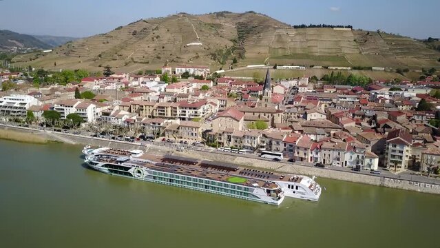River Cruise Ship and Terraced Vineyard in Background, in Rhone Valley