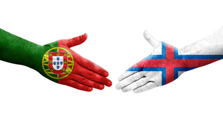 Handshake between Faroe Islands and Portugal flags painted on hands, isolated transparent image.