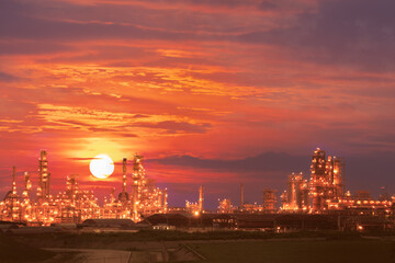 Fototapeta premium Gas turbine electrical power plant in the night with light power, for factory energy concept, oil industrial, natural gas, air pollution.