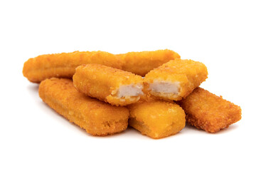 Tasty crispy fried fish sticks (fish fingers) on white background. Fast food concept.