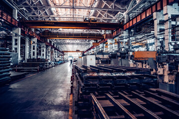 Fototapeta premium Assembly workshop at big industrial plant. Tractor assembling